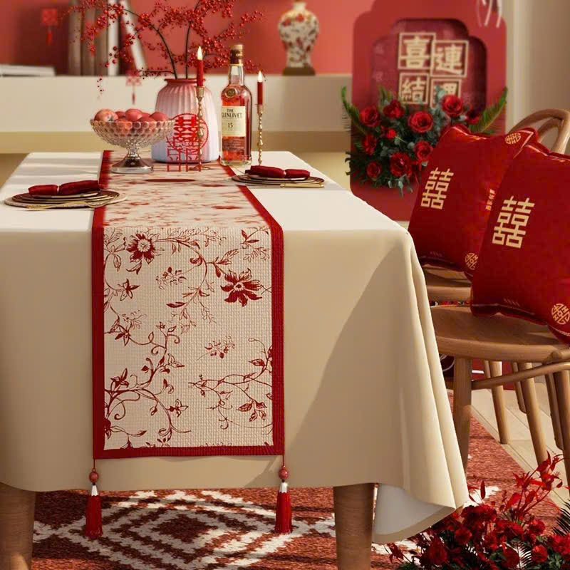 White Table Runner with Red Border and Floral Pattern